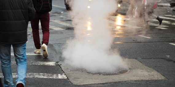 Steam from street utility opening