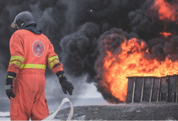 Firefighter near active fire