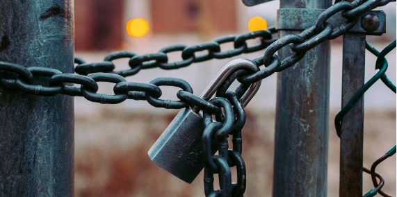 Padlock and chain on a gate