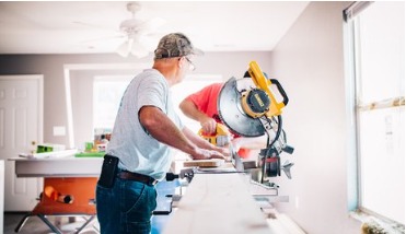 Maintenance worker making a repair